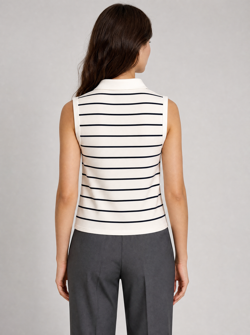 Back view of a cream striped sleeveless knit polo showing the collar and shoulder line