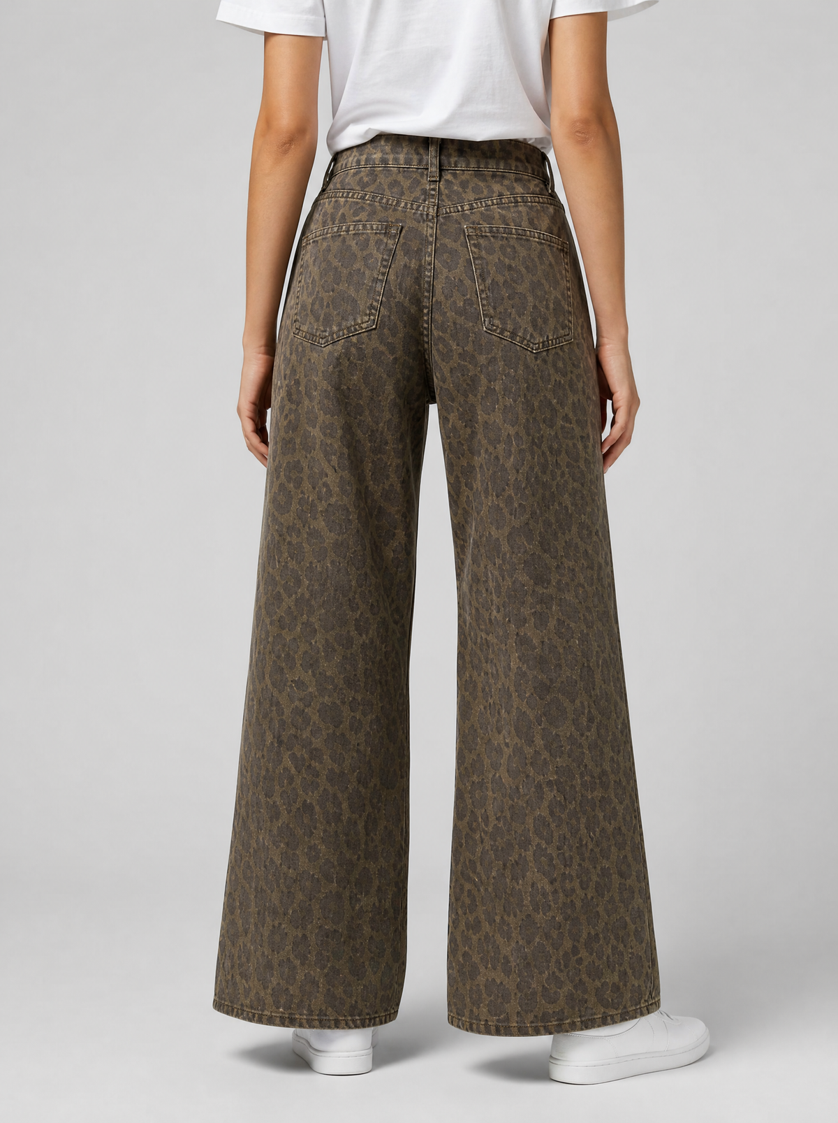 Back view of leopard print wide leg jeans showing the back pockets and yoke