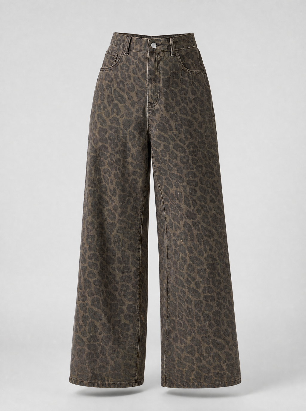 Leopard print wide leg jeans shown on their own against a light grey background