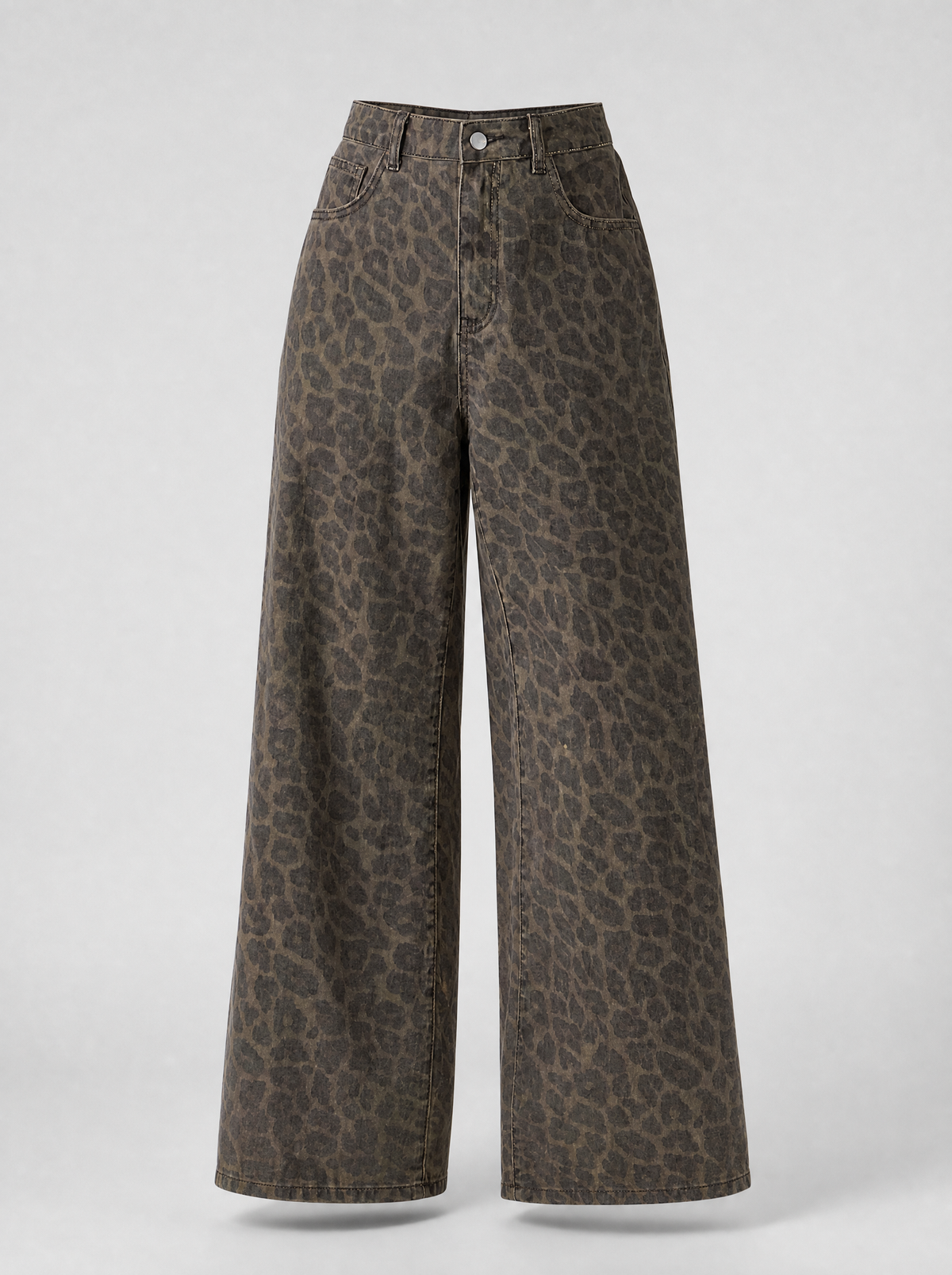 Leopard print wide leg jeans shown on their own against a light grey background