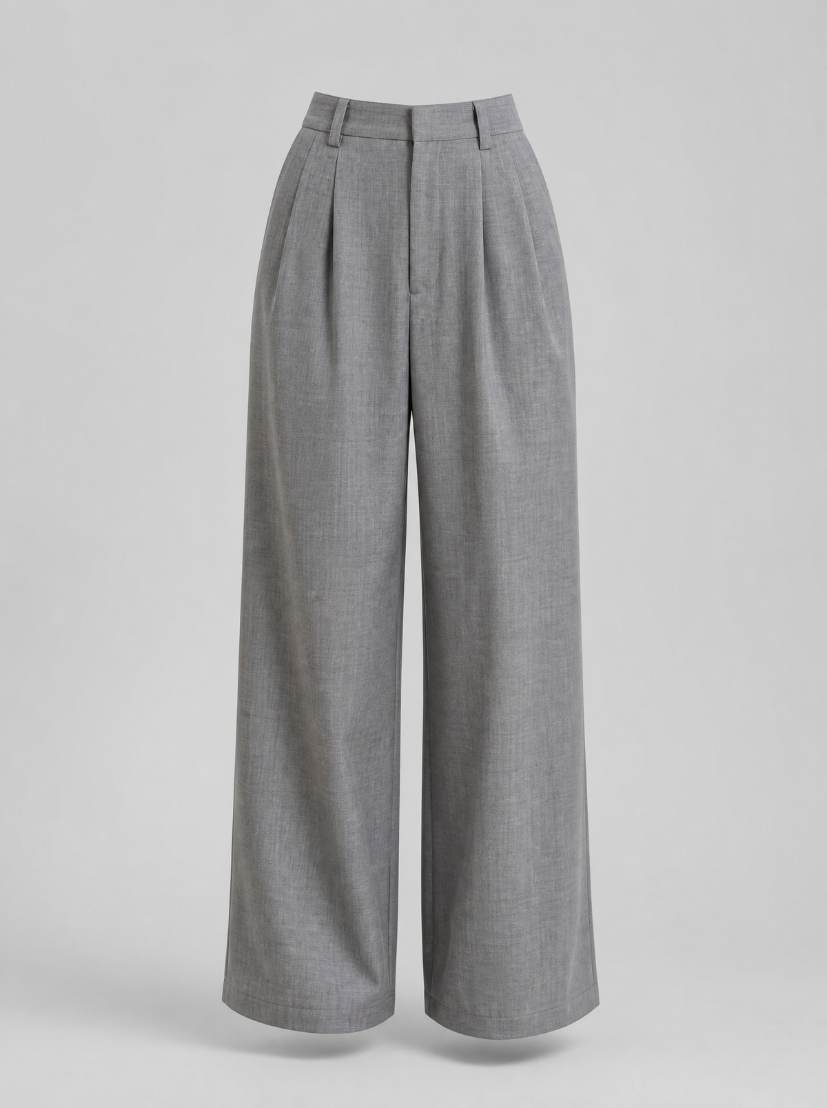 Grey pleated wide leg tailored trousers shown on their own against a light grey background