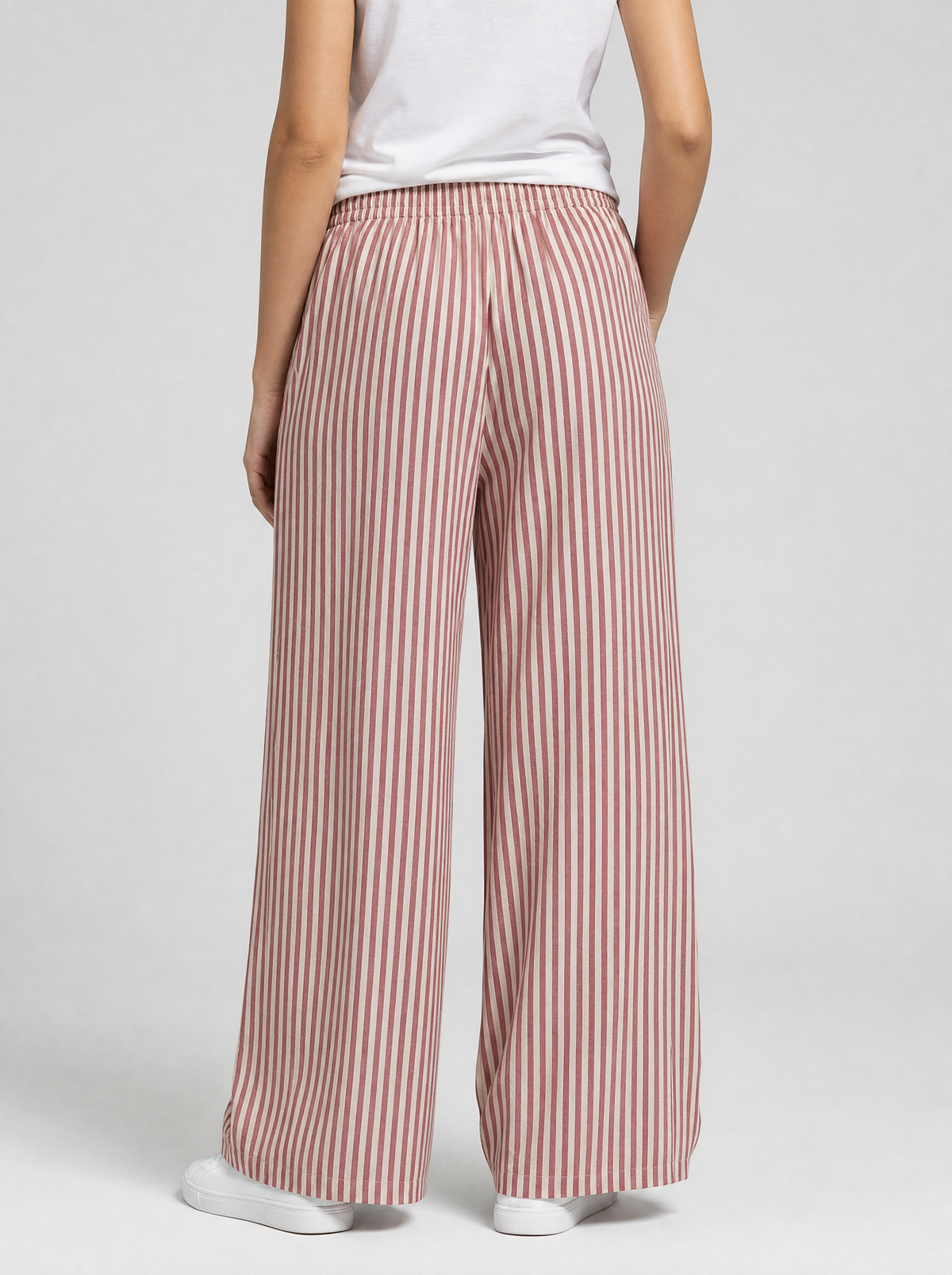 Back view of red striped wide leg pants showing the elastic waist and leg width