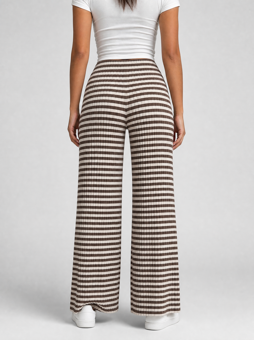 Back view of brown striped rib knit wide leg pants showing the elastic waist