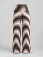 Brown striped rib knit wide leg pants shown on their own against a light grey background