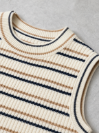 Close up of the ribbed crew neck and fine stripe knit on a cream sleeveless vest
